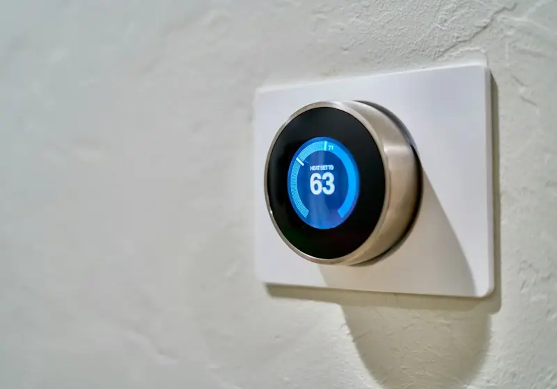 Thermostat on a living room wall